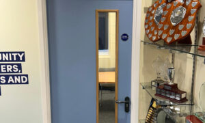 How long will a fire door hold back a fire?